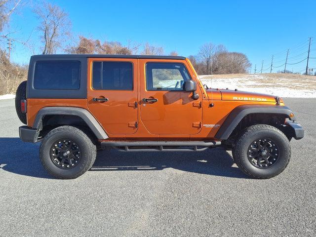 used 2011 Jeep Wrangler Unlimited car, priced at $17,991