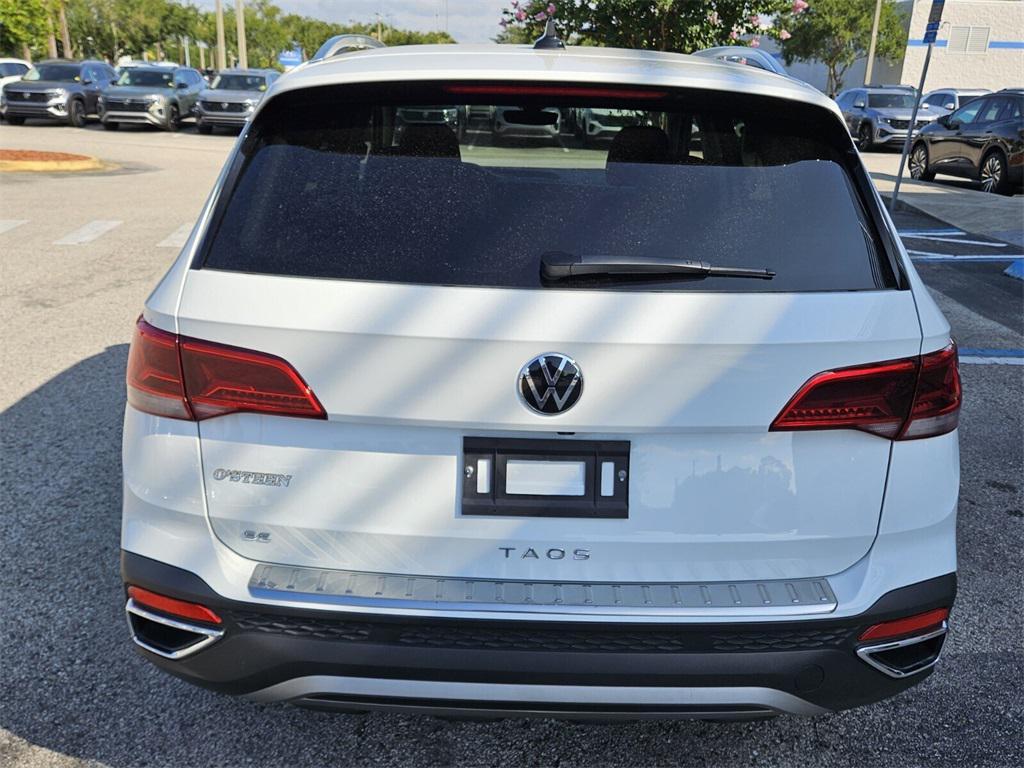 used 2024 Volkswagen Taos car, priced at $23,795