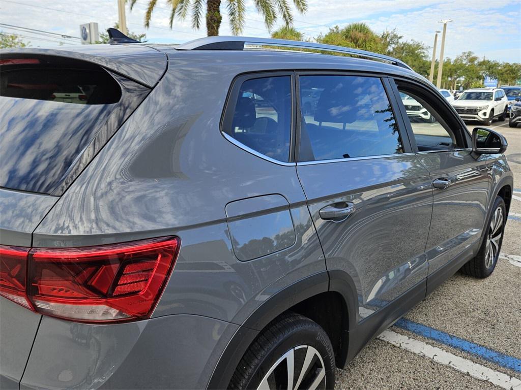used 2024 Volkswagen Taos car, priced at $23,395
