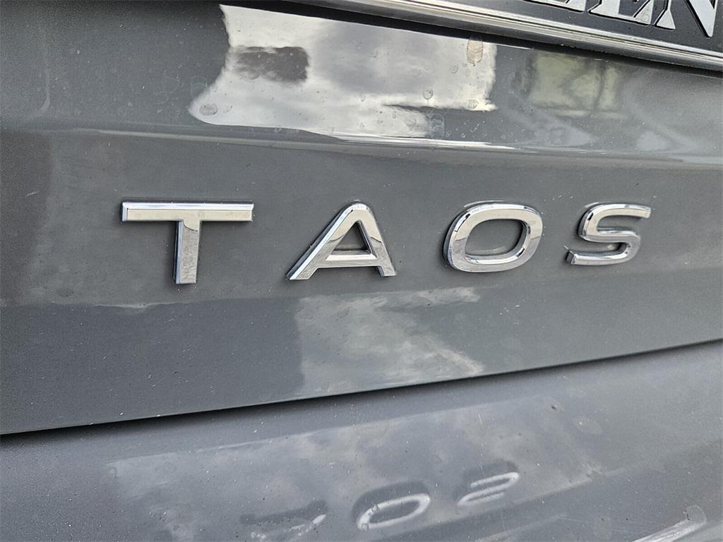 used 2024 Volkswagen Taos car, priced at $23,395