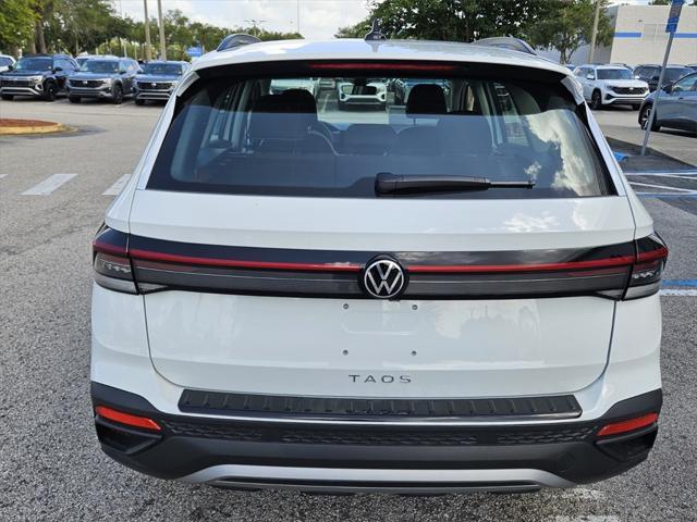 new 2025 Volkswagen Taos car, priced at $26,191