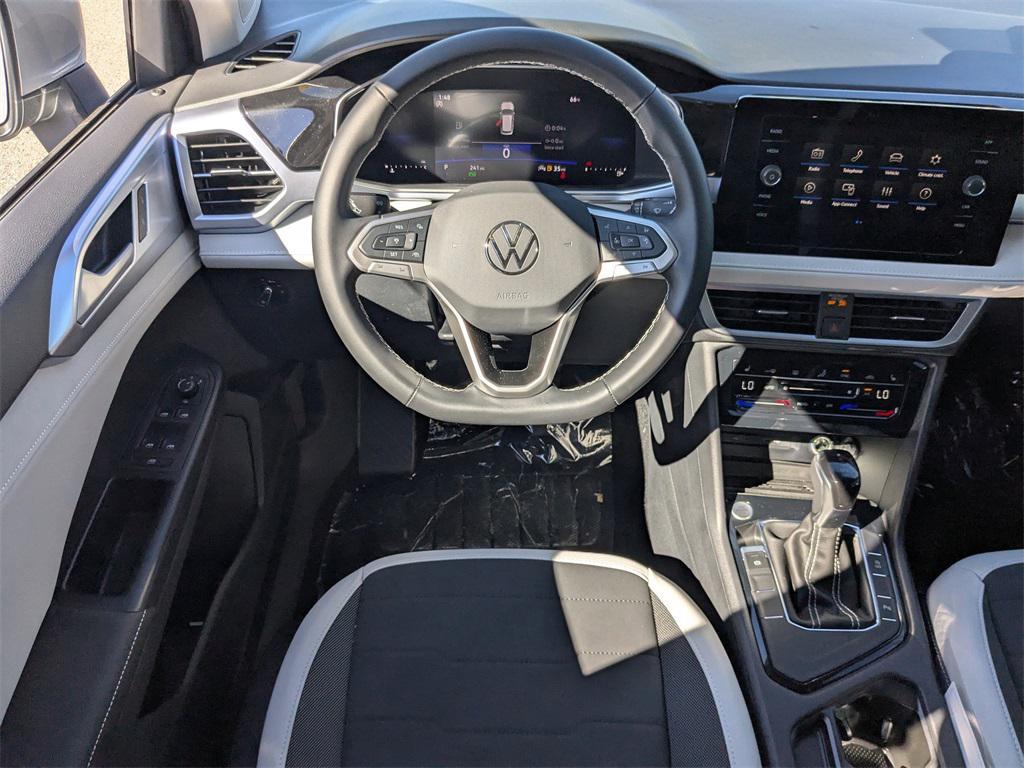 new 2025 Volkswagen Taos car, priced at $26,995