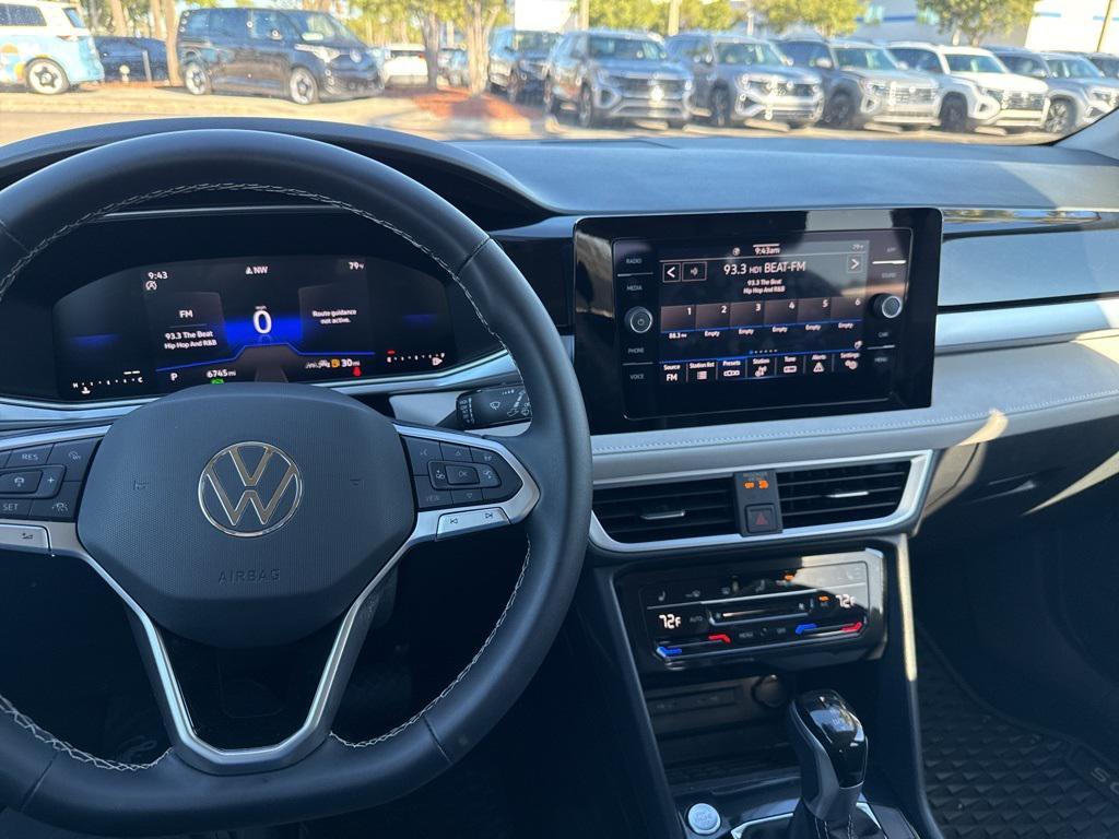 used 2025 Volkswagen Taos car, priced at $27,995