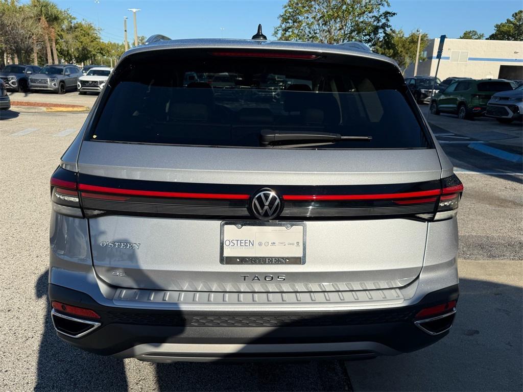used 2025 Volkswagen Taos car, priced at $26,995