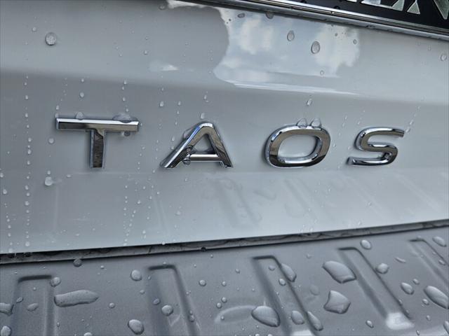 new 2024 Volkswagen Taos car, priced at $26,011