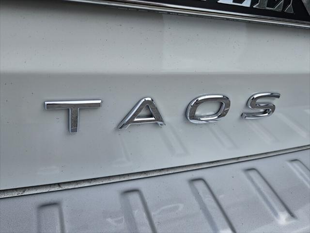 new 2024 Volkswagen Taos car, priced at $26,011