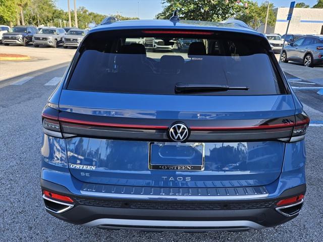 new 2025 Volkswagen Taos car, priced at $28,998