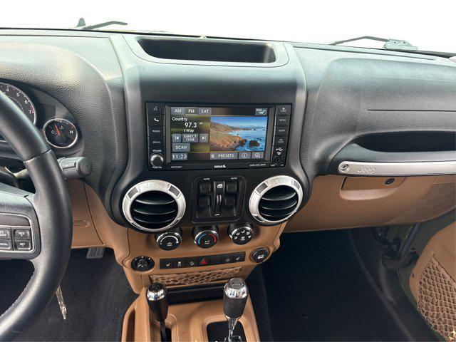 used 2015 Jeep Wrangler Unlimited car, priced at $14,871