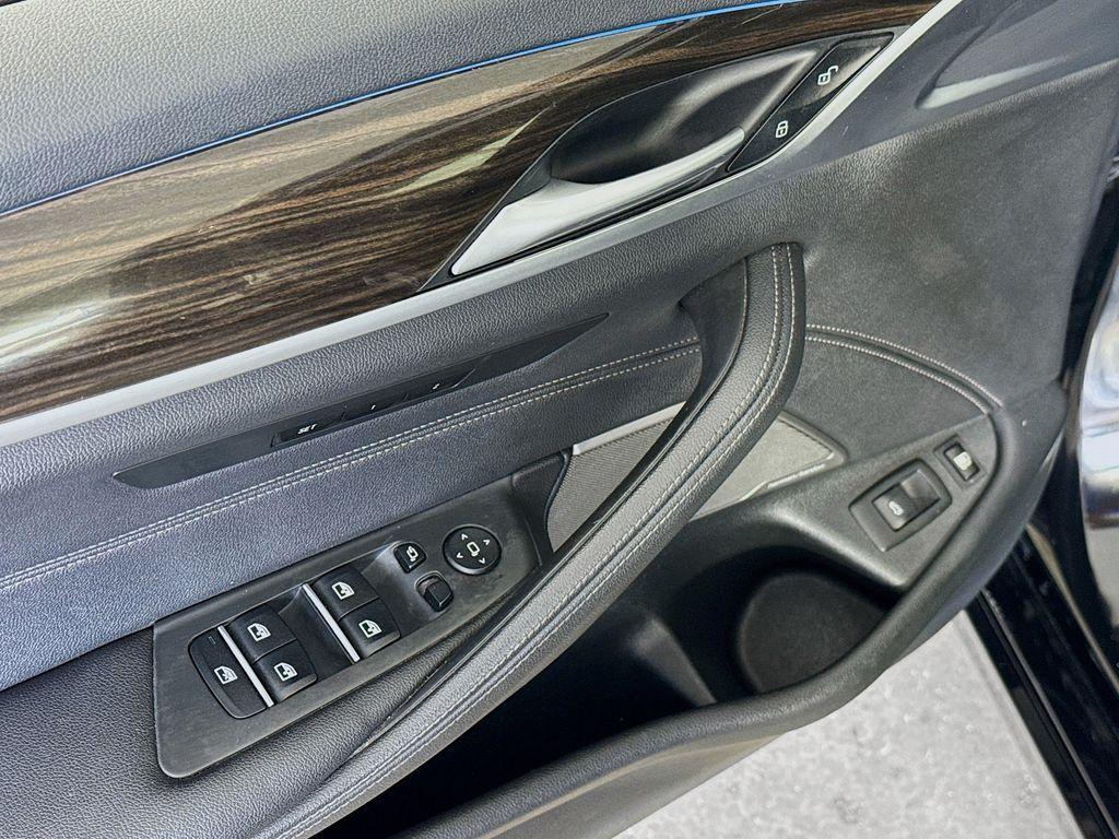 used 2023 BMW 530e car, priced at $27,999