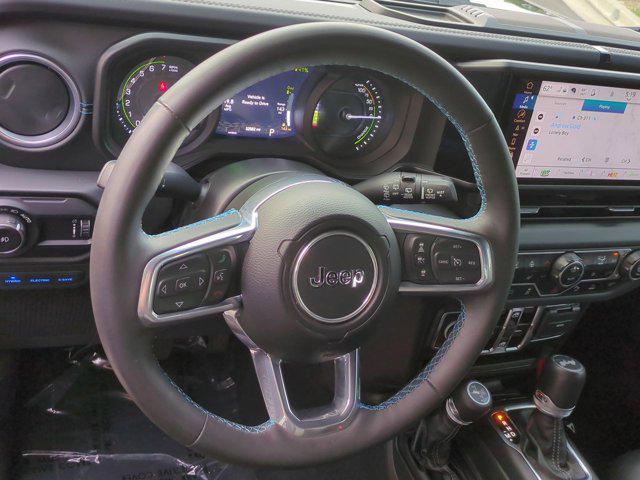 used 2024 Jeep Wrangler 4xe car, priced at $41,851