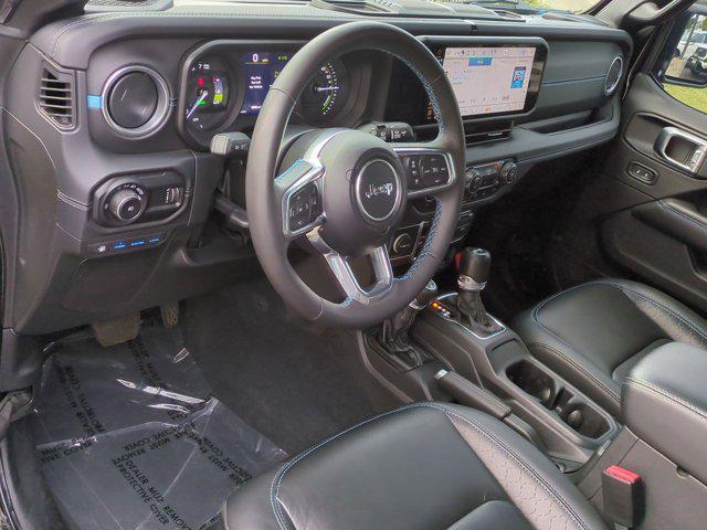 used 2024 Jeep Wrangler 4xe car, priced at $41,851