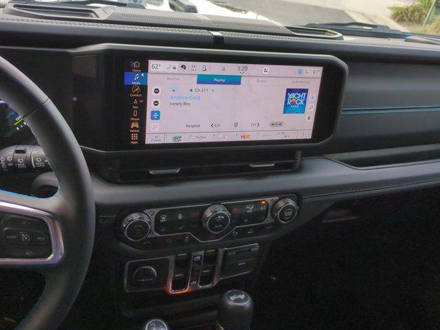 used 2024 Jeep Wrangler 4xe car, priced at $41,851