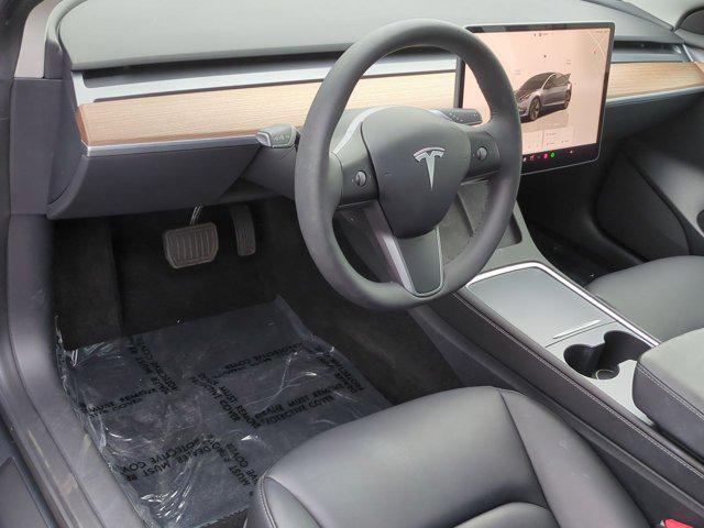 used 2023 Tesla Model 3 car, priced at $27,851