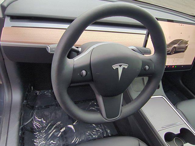 used 2023 Tesla Model 3 car, priced at $27,851