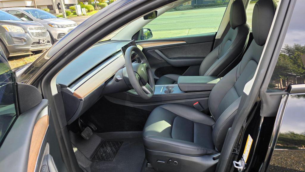 used 2023 Tesla Model Y car, priced at $25,950