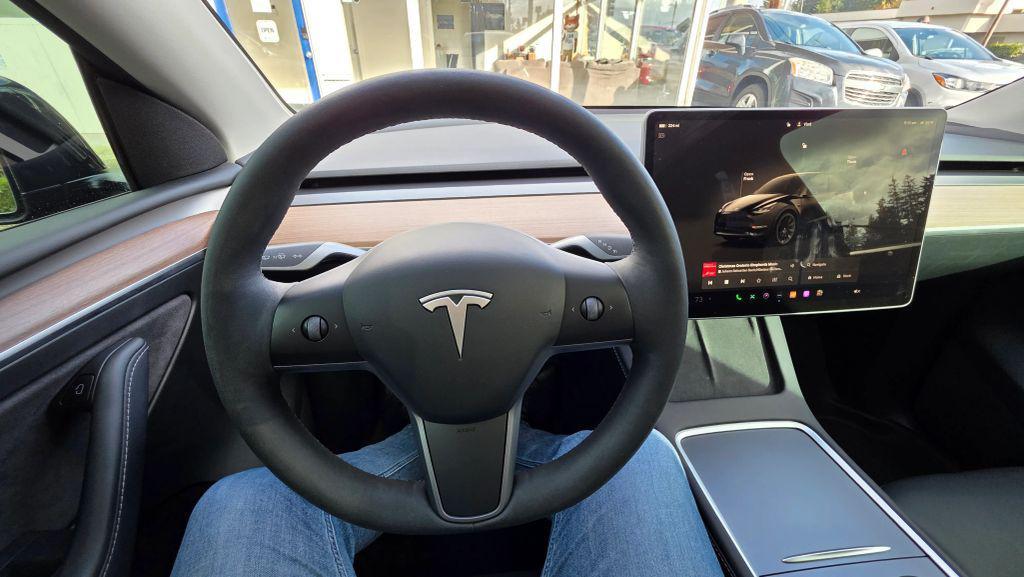 used 2023 Tesla Model Y car, priced at $25,950
