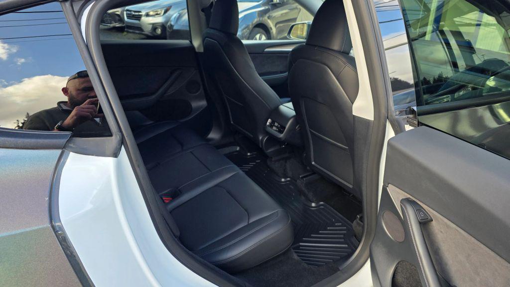 used 2023 Tesla Model Y car, priced at $25,950