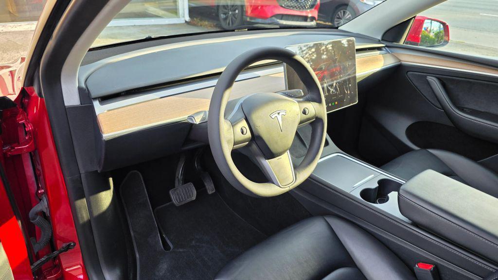 used 2023 Tesla Model Y car, priced at $24,950