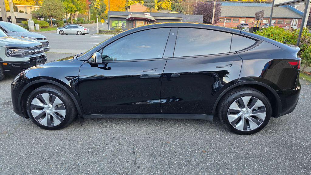 used 2023 Tesla Model Y car, priced at $24,950
