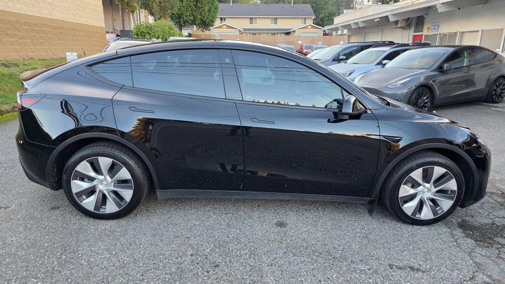 used 2023 Tesla Model Y car, priced at $24,950
