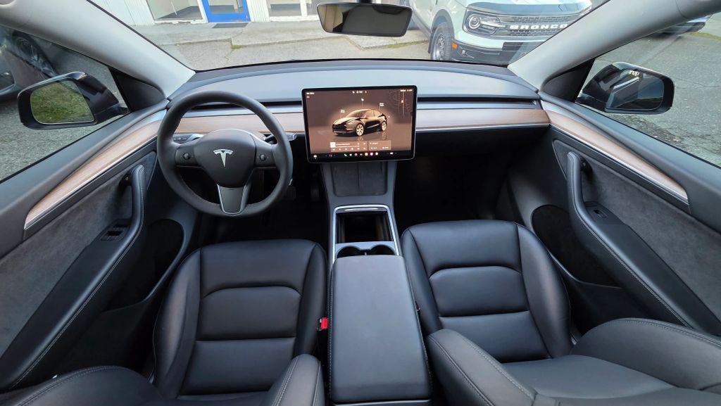 used 2023 Tesla Model Y car, priced at $24,950