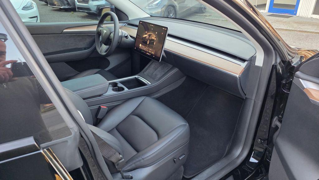 used 2023 Tesla Model Y car, priced at $24,950