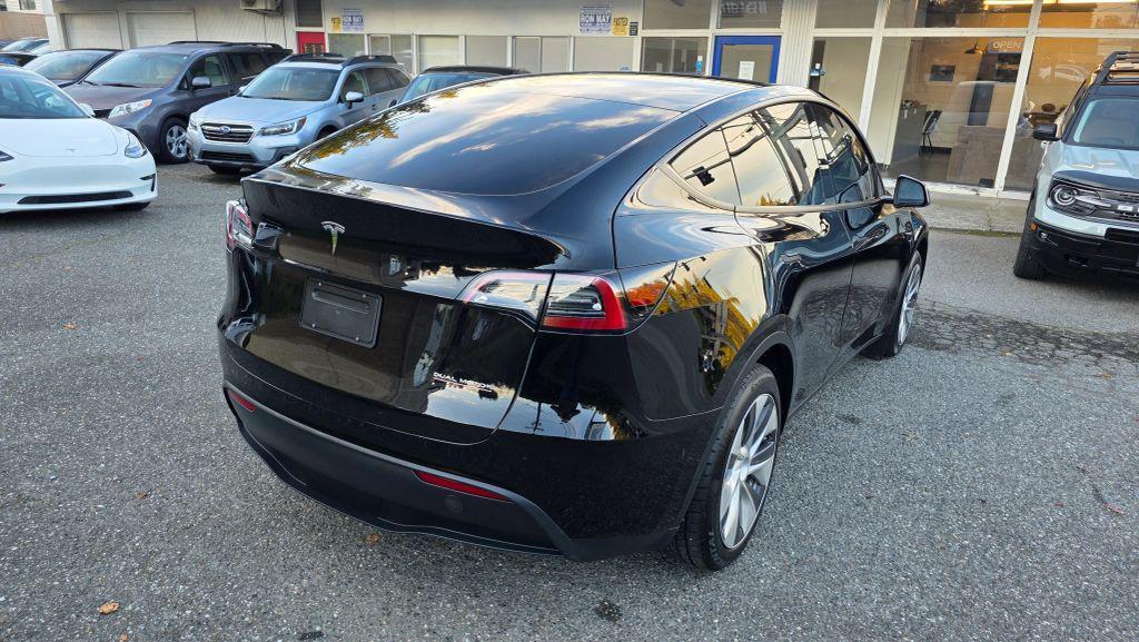 used 2023 Tesla Model Y car, priced at $24,950