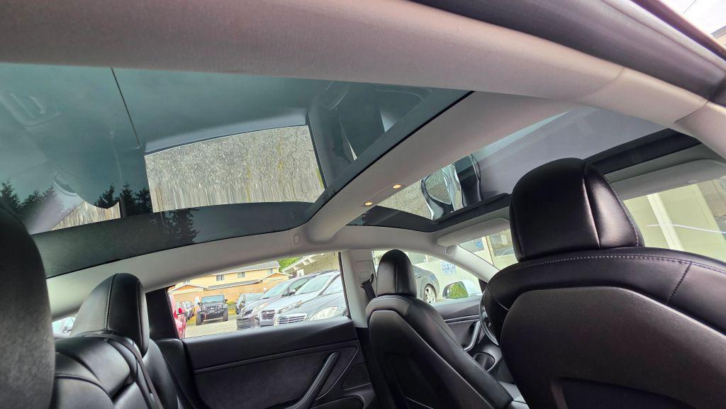 used 2018 Tesla Model 3 car, priced at $18,997