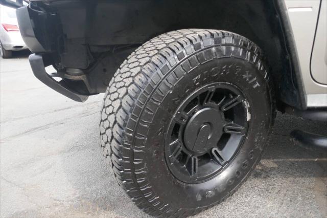 used 2003 Hummer H2 car, priced at $15,995