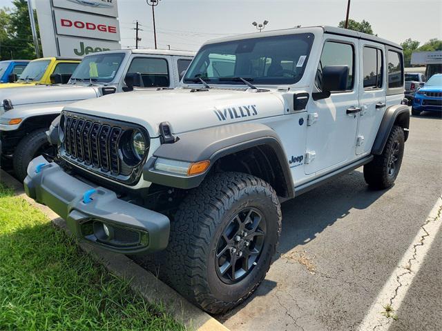 new 2024 Jeep Wrangler 4xe car, priced at $44,176