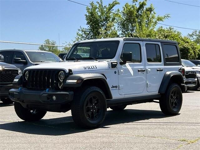 used 2023 Jeep Wrangler 4xe car, priced at $29,896
