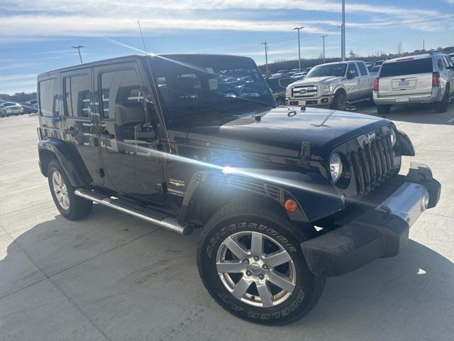 used 2015 Jeep Wrangler Unlimited car, priced at $15,620