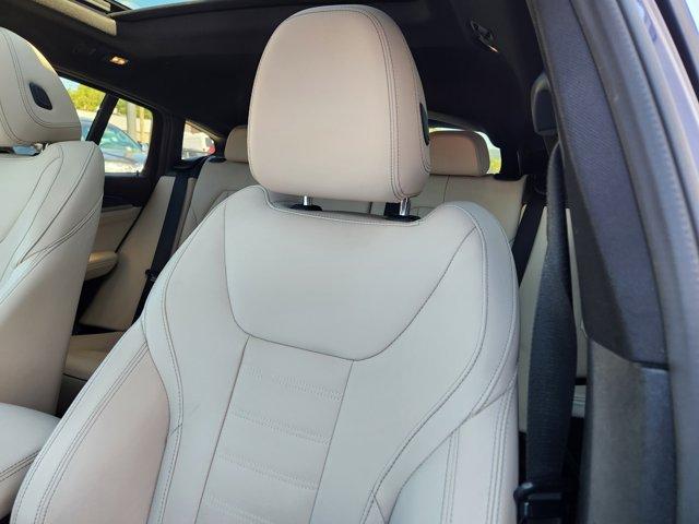 used 2022 BMW X4 car, priced at $34,944