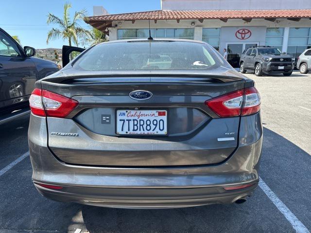 used 2016 Ford Fusion car, priced at $9,999