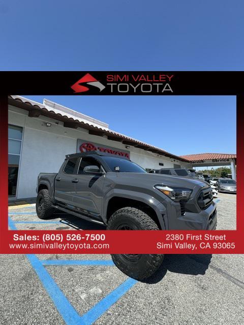 used 2024 Toyota Tacoma car, priced at $49,999