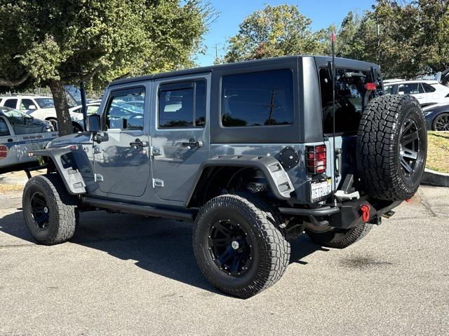 used 2015 Jeep Wrangler Unlimited car, priced at $23,745