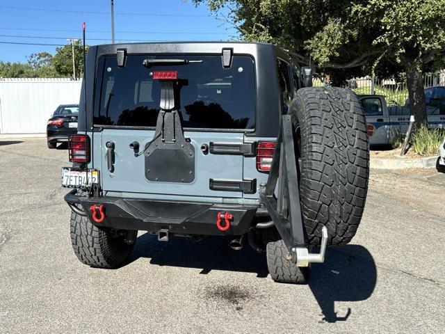 used 2015 Jeep Wrangler Unlimited car, priced at $23,745