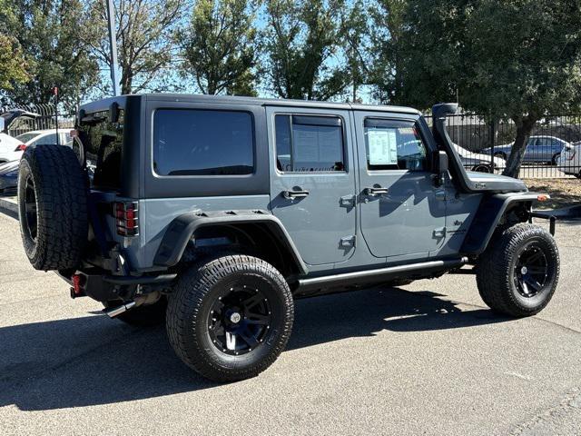 used 2015 Jeep Wrangler Unlimited car, priced at $23,745