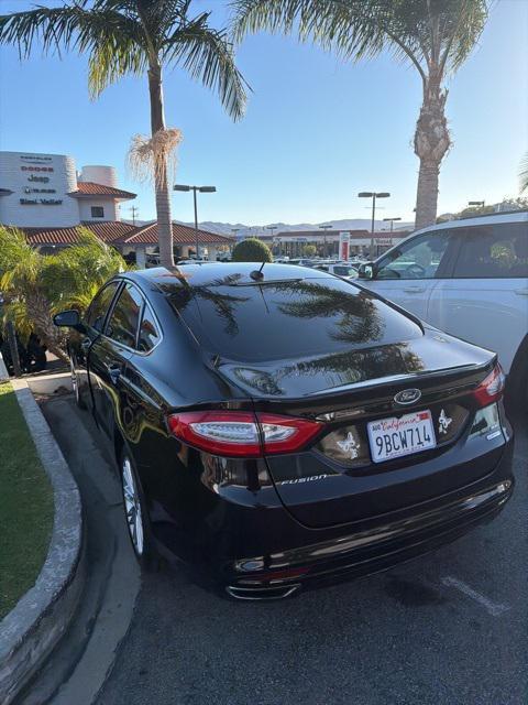 used 2016 Ford Fusion car, priced at $9,999