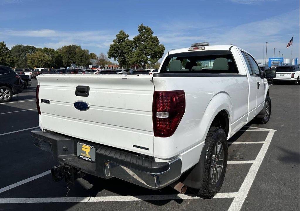 used 2014 Ford F-150 car, priced at $10,900