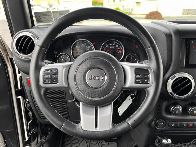 used 2015 Jeep Wrangler Unlimited car, priced at $19,300