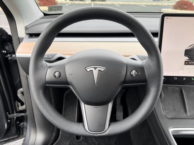 used 2023 Tesla Model Y car, priced at $33,900