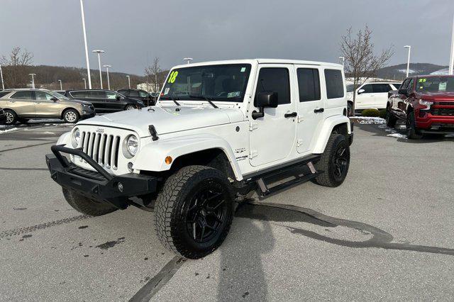 used 2018 Jeep Wrangler JK Unlimited car, priced at $19,577