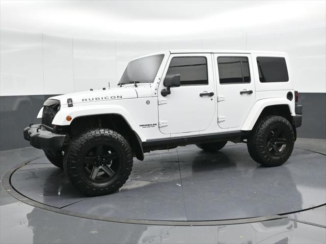 used 2014 Jeep Wrangler Unlimited car, priced at $20,990