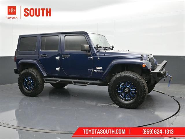 used 2013 Jeep Wrangler Unlimited car, priced at $17,890