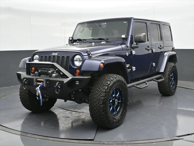 used 2013 Jeep Wrangler Unlimited car, priced at $17,890