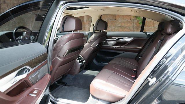 used 2022 BMW 740 car, priced at $40,489