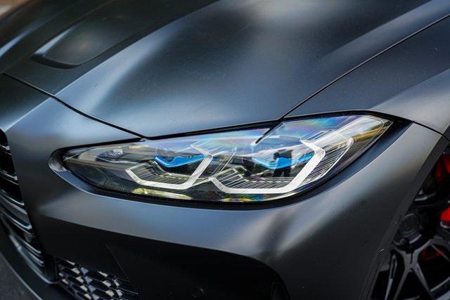 used 2023 BMW M4 car, priced at $74,669