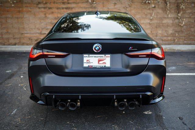 used 2023 BMW M4 car, priced at $74,669