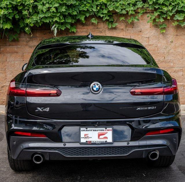 used 2021 BMW X4 car, priced at $31,487